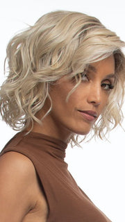 Loose layers and romantic waves create a week look