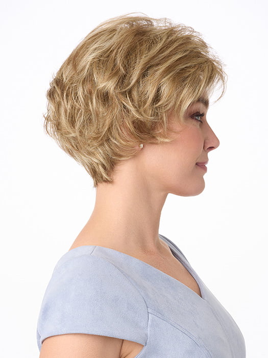 Model is wearing BRYN by ENVY in color DARK BLONDE | 2 toned blend of Dark Honey Blonde with Lighter Blonde highlights