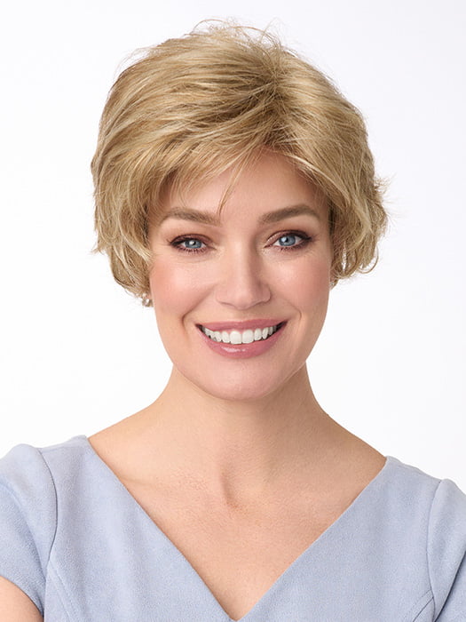 Model is wearing BRYN by ENVY in color DARK BLONDE | 2 toned blend of Dark Honey Blonde with Lighter Blonde highlights