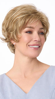 Model is wearing BRYN by ENVY in color DARK BLONDE | 2 toned blend of Dark Honey Blonde with Lighter Blonde highlights