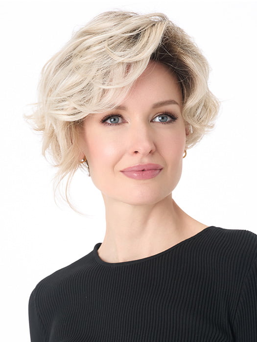 Model is wearing CARRISSA by ENVY in color PLATINUM SHADOW | Light Blonde with Dark Roots