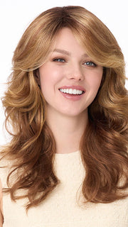 Model is wearing CHRISTINE by ENVY in color GOLDEN NUTMEG | Medium Brown roots with overall Warm Cinnamon base and Golden Blonde highlights