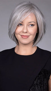 Model is wearing DION in color COCANUT MILK GREY R | Creamy, off-white tones with soft gray hues, creating a pearlescent or silvery finish.