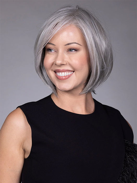 Model is wearing DION in color COCANUT MILK GREY R | Creamy, off-white tones with soft gray hues, creating a pearlescent or silvery finish.