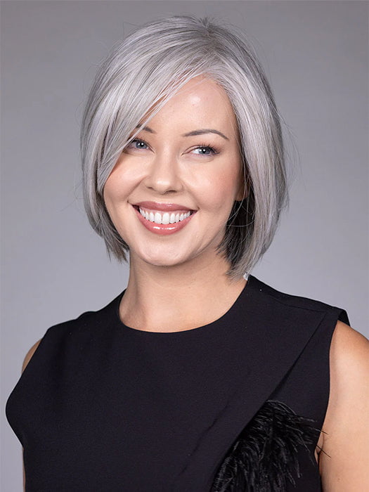 Model is wearing DION in color COCANUT MILK GREY R | Creamy, off-white tones with soft gray hues, creating a pearlescent or silvery finish.
