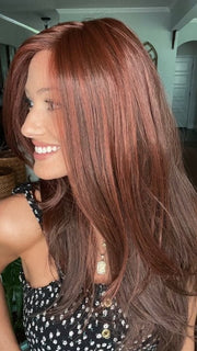 Jenna Fail @jenna_fail wearing GLAM by TRESSALLURE in color 10/130R | Bright Red with Medium Brown Roots