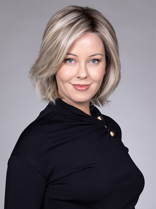 Model is wearing ELSA by BELLETRESS in color BUTTERBEER R | Dark Brown Base and Root that transitions smoothly into a buttery blonde, infused with creamy honey and toffee tones