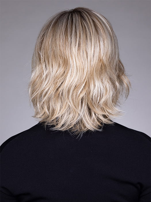 Model is wearing ELSA by BELLETRESS in color BUTTERBEER R | Dark Brown Base and Root that transitions smoothly into a buttery blonde, infused with creamy honey and toffee tones