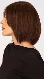 Roxie is wearing MUSE by ELLEN WILLE in color DARK CHOCOLATE MIX 4.33.6 | Darkest Brown, Dark Auburn and Dark Brown Blend