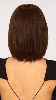 Roxie is wearing MUSE by ELLEN WILLE in color DARK CHOCOLATE MIX 4.33.6 | Darkest Brown, Dark Auburn and Dark Brown Blend