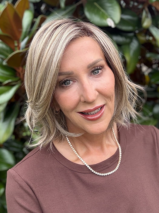 Eileen @crazywiglady is wearing ELSA by BELLE TRESS in color SPARKLING CHAMPAGNE BLONDE R | A radiant blend of champagne blonde with soft golden and beige tones, grounded by natural-looking roots in ash brown and dark blonde.