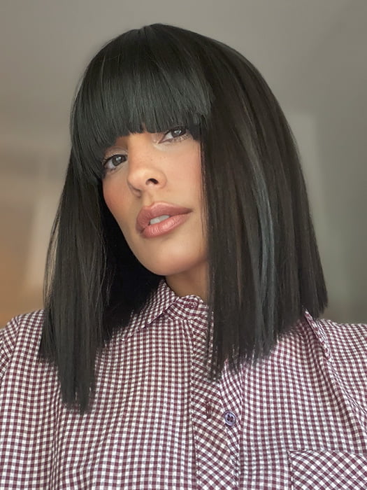 Model is wearing FRINGE EFFECT by HAIRDO in color R2 EBONY | Black