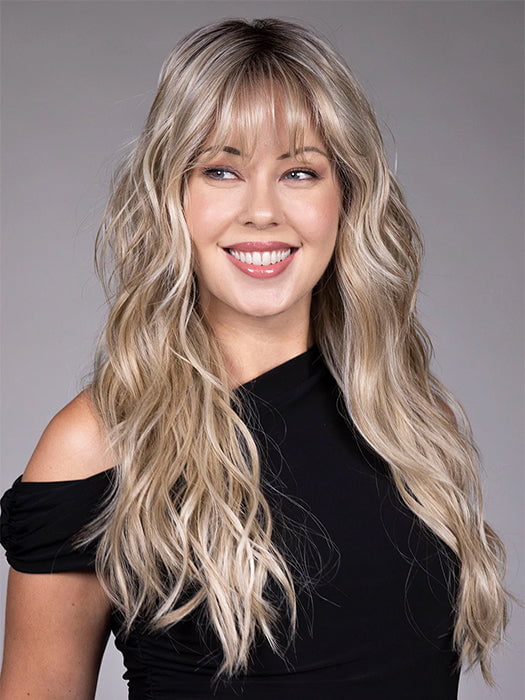 Model is wearing GAIA in BUTTER BEER R | Dark Brown Base and Root that transitions smoothly into a buttery blonde, infused with creamy honey and toffee tones