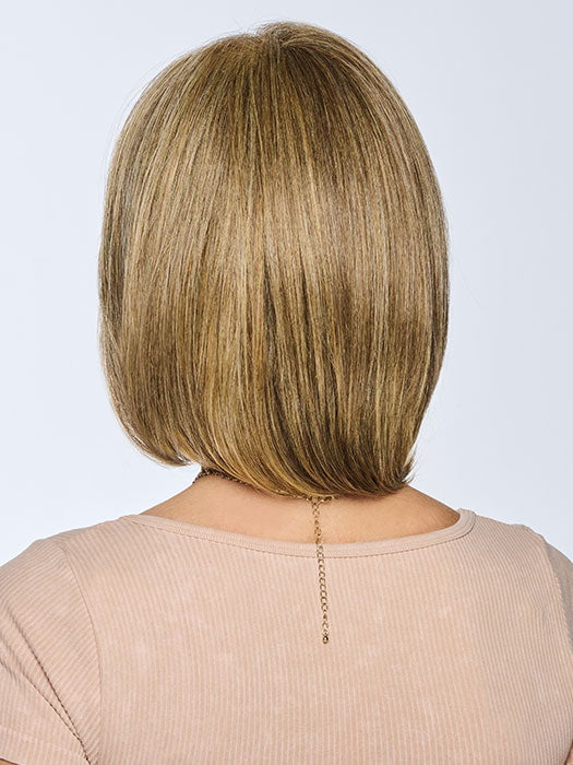 Model is wearing AMBITIOUSLY BEAUTIFUL in BROWN-BLONDE | Medium to Light Brown with salon highlights