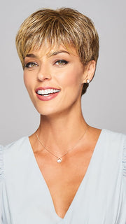 Model is wearing DETERMINATION by GABOR in color BROWN-BLONDE | Medium to Light Brown with Salon Highlights
