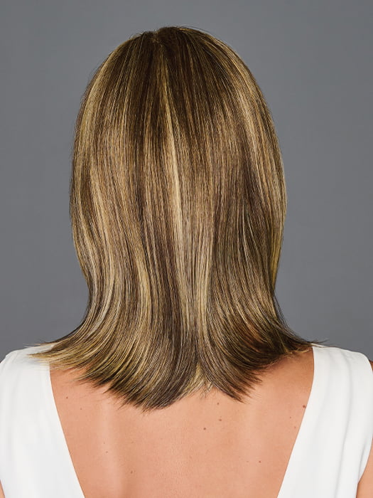 Model is wearing ILLUMINATION by GABOR in color BROWN-BLONDE | Medium to Light Brown with Salon Highlights