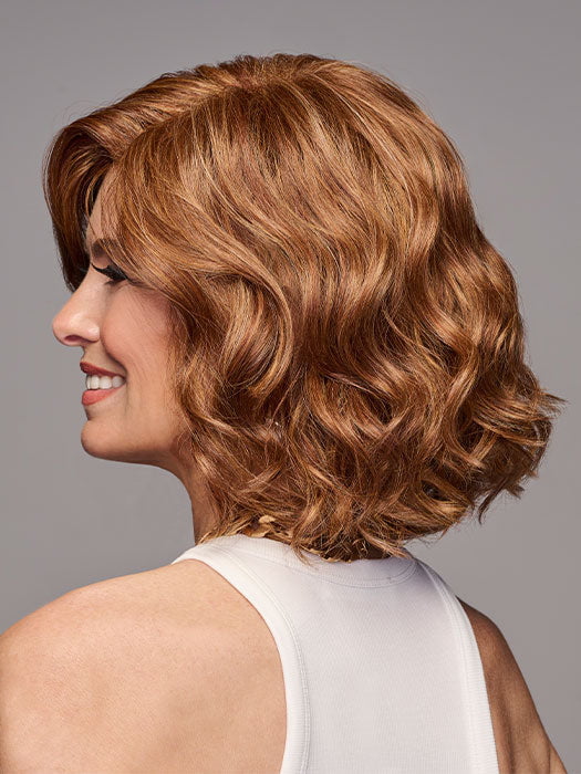 Model is wearing IN BLOOM in MEDIUM RED | Medium Reddish Brown with Subtle Copper Highlights