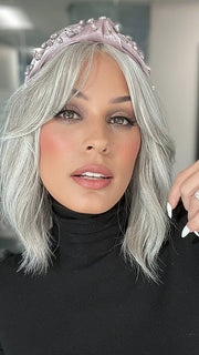 Roxie is wearing HOLLIE PETITE by JON RENAU in shade 56F51 OYSTER | Light Grey with 20% Medium Brown Front, graduating to Grey with 30% Medium Brown Nape (headband not included)