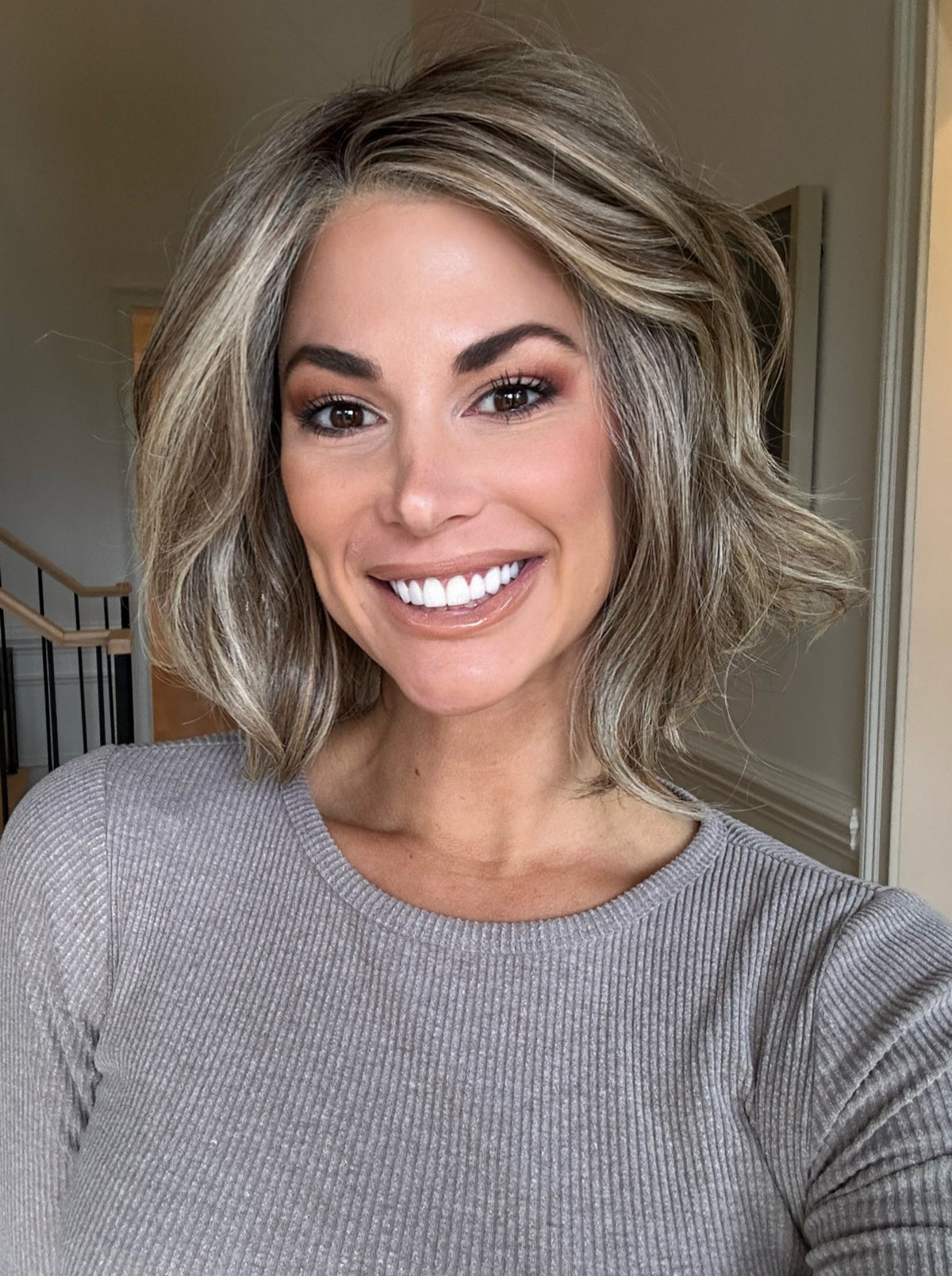 Katy C.  @thewigeducator wearing UNFILTERED by RAQUEL WELCH WIGS in color RL12/22SS SHADED CAPPUCCINO | Light Golden Brown Evenly Blended with Cool Platinum Blonde Highlights with Dark Roots