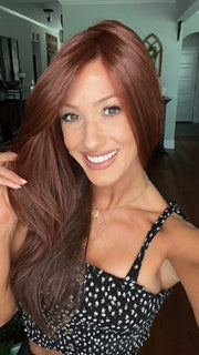 Jenna Fail @jenna_fail wearing GLAM by TRESSALLURE in color 10/130R | Bright Red with Medium Brown Roots