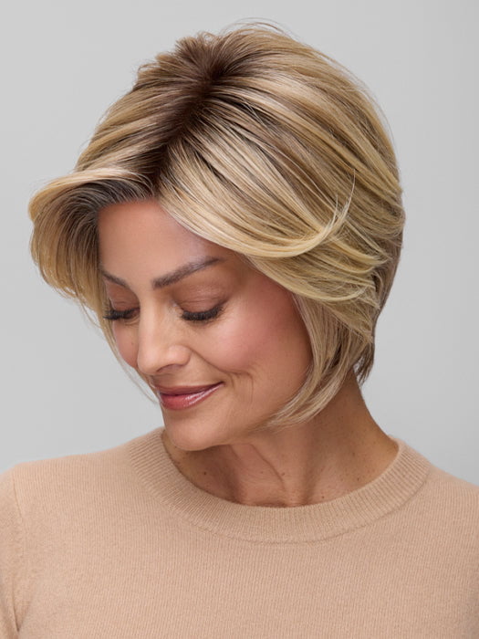 Model is wearing IVY in 12FS8 | SHADED PRALINE | Light Gold Brown, Light Natural Gold Blonde & Pale Natural Gold-Blonde Blend, Shaded with Medium Brown