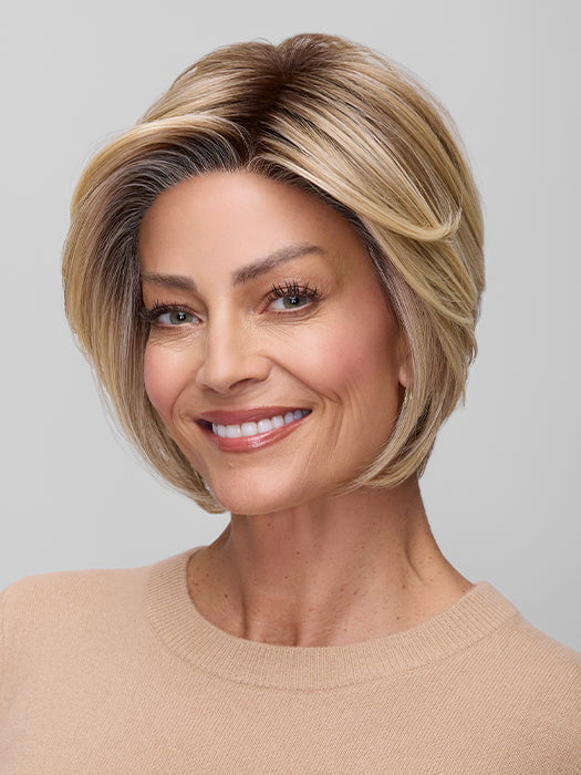 Model is wearing IVY in 12FS8 | SHADED PRALINE | Light Gold Brown, Light Natural Gold Blonde & Pale Natural Gold-Blonde Blend, Shaded with Medium Brown