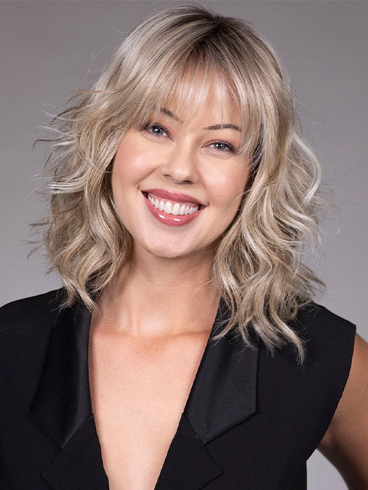 Model is wearing JIL in BUTTERBEER R | Dark Brown Base and Root that transitions smoothly into a buttery blonde, infused with creamy honey and toffee tones