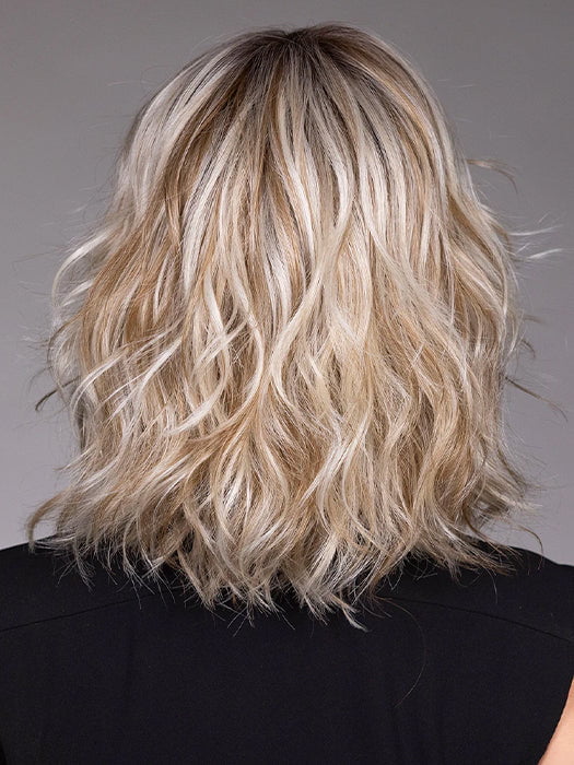 Model is wearing JIL in BUTTERBEER R | Dark Brown Base and Root that transitions smoothly into a buttery blonde, infused with creamy honey and toffee tones