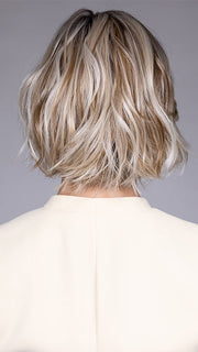 Model is wearing KATE by BELLETRESS in color BUTTERBEER R | Dark Brown Base and Root that transitions smoothly into a buttery blonde, infused with creamy honey and toffee tones