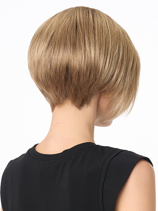 Model is wearing KARI by ENVY in color SPARKLING CHAMPAGNE | Medium Brown roots with overall Strawberry Blonde base and soft Golden Blonde highlights