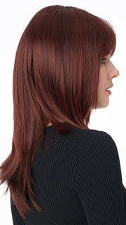 Model is wearing KATE by ENVY in color DARK-RED | Auburn with Brighter Red highlights