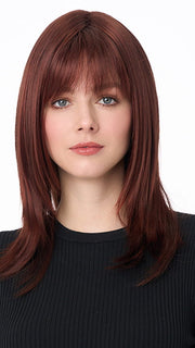 Model is wearing KATE by ENVY in color DARK-RED | Auburn with Brighter Red highlights