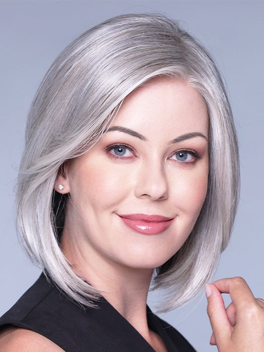 A sleek mid-length bob that you can style to have waves or curls for a more playful hairdo