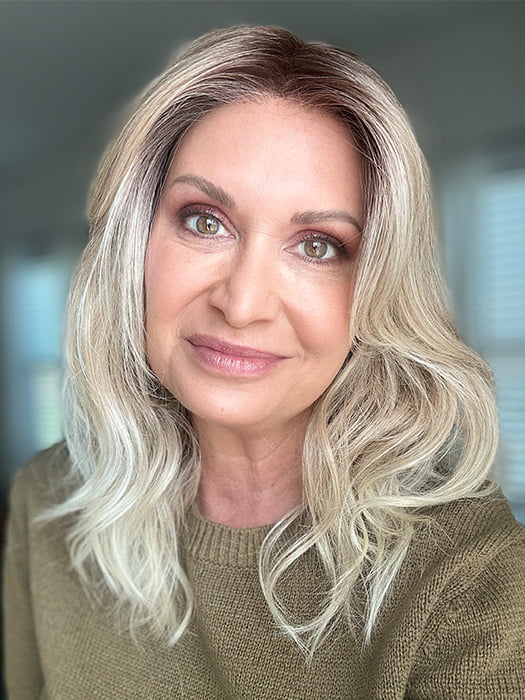 Emily H. @she_sheds_more wearing MAUDE by RENE OF PARIS in color MELTED-SAND | Rich, warm brown root melts into the neutral blond tone. Light-beige blond ends complete this stunning color.