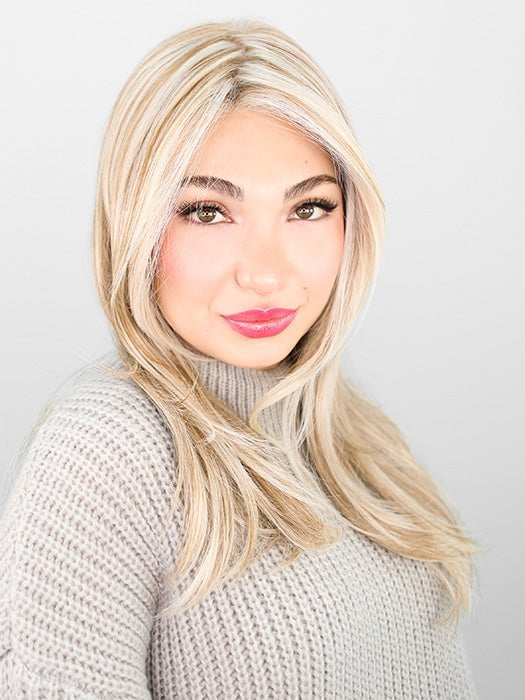 Maha wearing MESMERIZED by RAQUEL WELCH in RL19/23 BISCUIT | Light Ash Blonde Evenly Blended with Cool Platinum Blonde