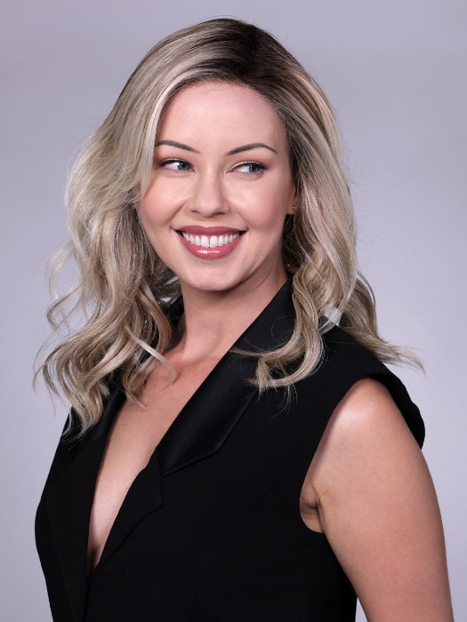 Model is wearing OXFORD in coklor MILKSHAKE BLONDE R | A mixture of Light Sandy Brown, Highlighted with Light Ash Blonde with a Hint of Light Platinum Blonde with a Medium Root Color