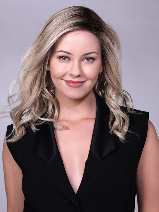 Model is wearing OXFORD in coklor MILKSHAKE BLONDE R | A mixture of Light Sandy Brown, Highlighted with Light Ash Blonde with a Hint of Light Platinum Blonde with a Medium Root Color