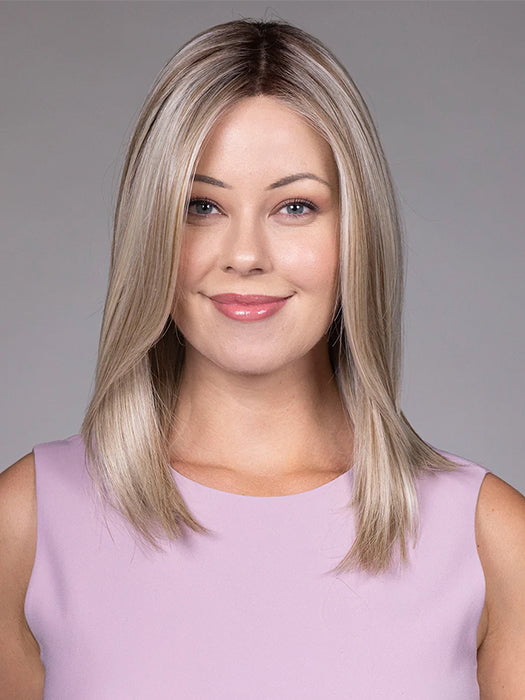 Model is wearing PIANA in color BUTTERBEER |  A rich blend of warm brunette and golden honey highlights finished with a soft, natural root.