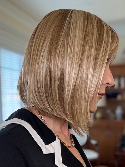 Eileen @crazywiglady is wearing PAIGE by ENVY in color SPARKLING CHAMPAGNE | Medium Brown roots with overall Strawberry Blonde base and soft Golden Blonde highlights