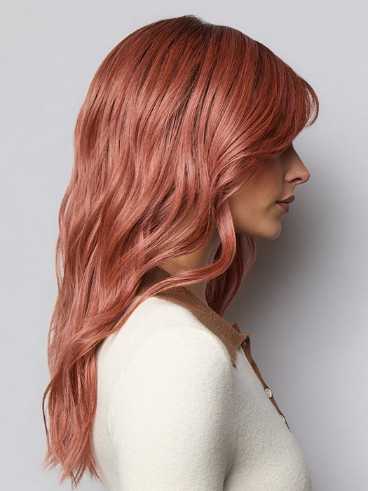 Model is wearing POSH WAVEZ in DUSTY ROSE | Medium Coral Red Base with Dark Brown Roots