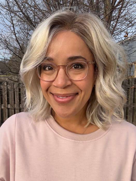 Brea @getwiggywithbrea wearing ARLO by ESTETICA in color SUNLIT-BLONDE | Soft Blend of Sandy Blonde, Lightest Blonde and Iced Blonde with a Light Golden Brown Root | outside lighting
