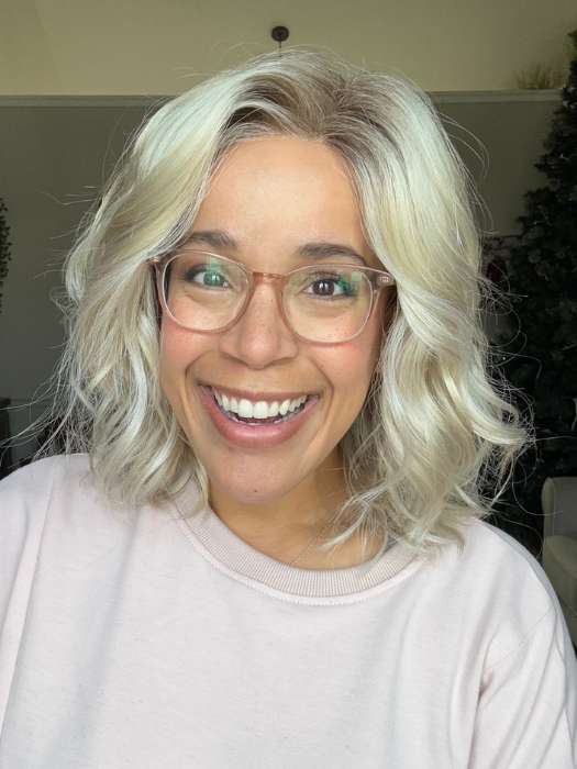 Brea @getwiggywithbrea wearing ARLO by ESTETICA in color SUNLIT-BLONDE | Soft Blend of Sandy Blonde, Lightest Blonde and Iced Blonde with a Light Golden Brown Root
