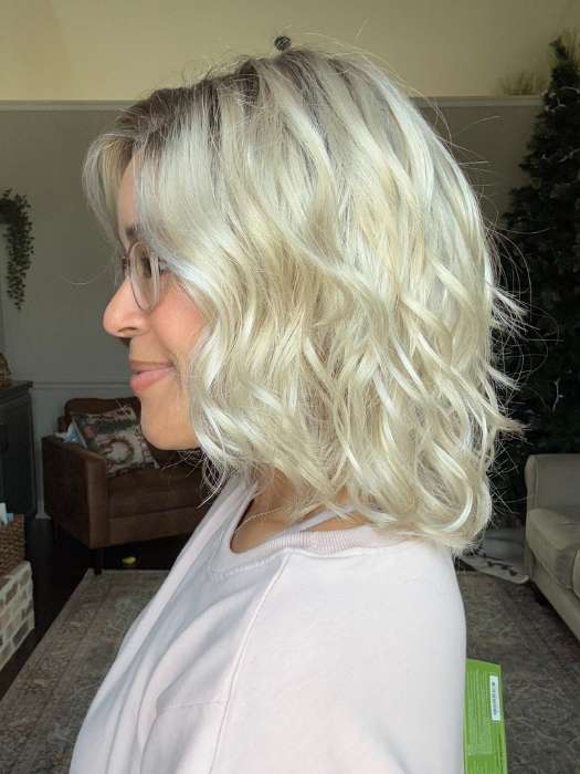 Brea @getwiggywithbrea wearing ARLO by ESTETICA in color SUNLIT-BLONDE | Soft Blend of Sandy Blonde, Lightest Blonde and Iced Blonde with a Light Golden Brown Root
