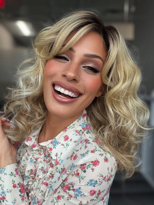 Roxie is wearing HEAVEN by ELLEN WILLE in SANDY BLONDE ROOTED 16.22.26 | Medium Blonde and Light Neutral Blonde with Light Golden Blonde Blend and Shaded Roots