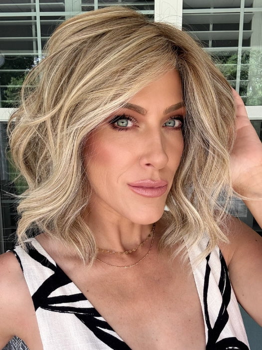 Kristyna wearing SIMMER ELITE PETITE by RAQUEL WELCH in RL16/21SS SHADED SAND | Light Blonde shaded with Medium Brown