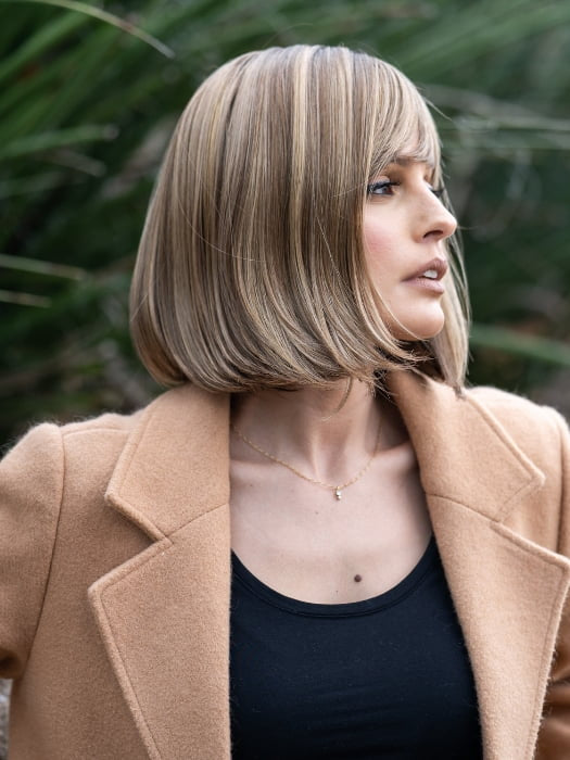 Roxie wearing PAIGE PETITE by ENVY in TOASTED SESAME | Medium Brown roots with overall Warm Cinnamon base and Golden Blonde highlights