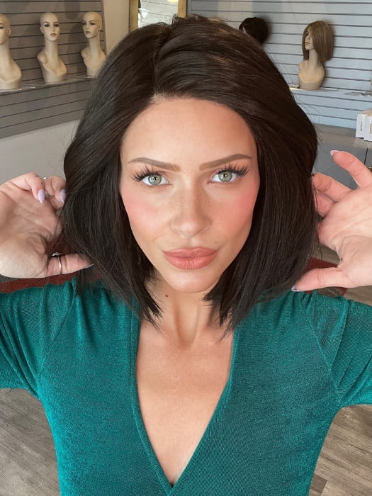 Madeline wearing EURO CHIC by TRESSALLURE in 2/4R | Very Dark Brown with highlights