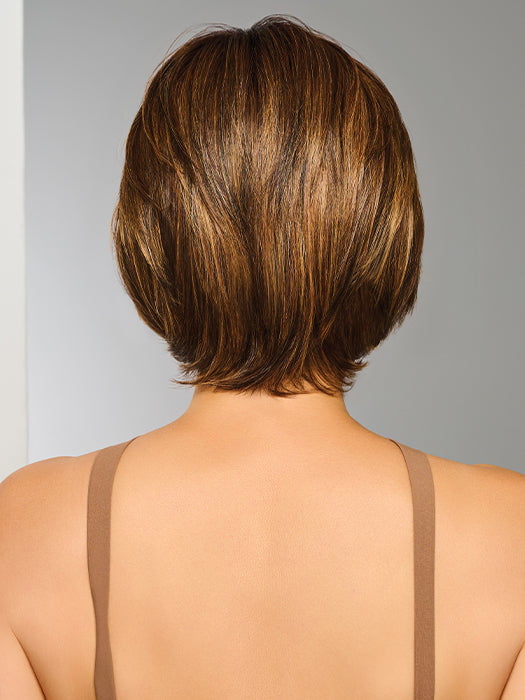 Model is wearing EFFORTLESS STYLE by RAQUEL WELCH in color RL8/29SS SHADED HAZELNUT | Warm Medium Brown Evenly Blended with Ginger Blonde with Dark Roots