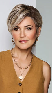 A layered boycut with face-framing bangs and tapered sides for a polished look