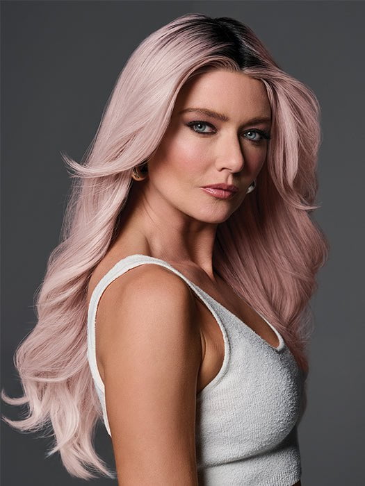 Model is wearing QUEUE THE HUE by RAQUEL WELCH in color PINK